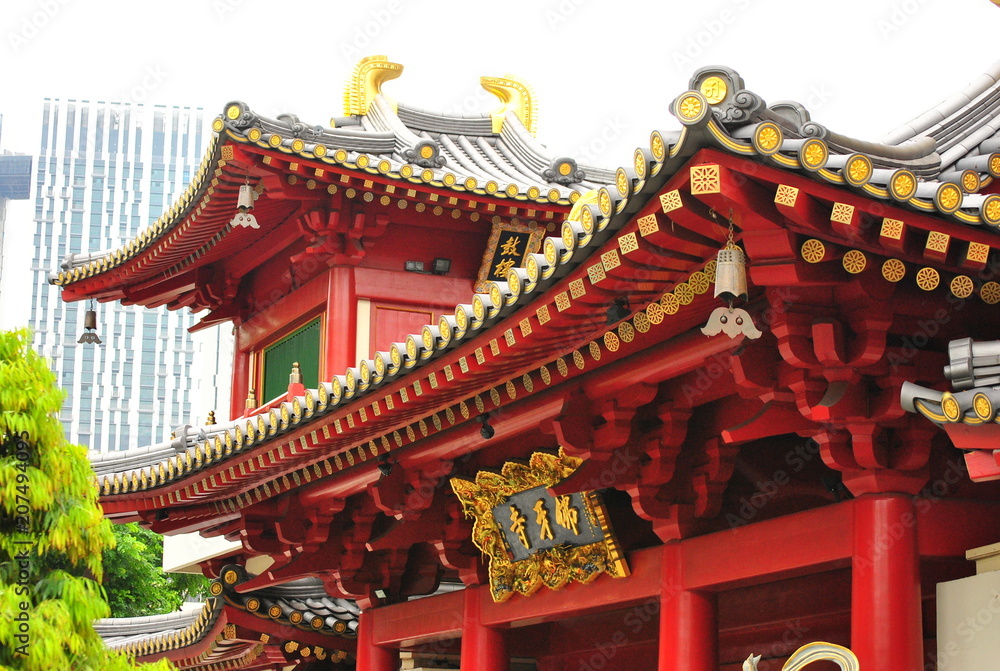 Rooftop of old historical red chinese temple building structure for praying worshipping with family chinese new year Rooftop of old historical red chinese temple building structure for praying worshipping with family chinese new year