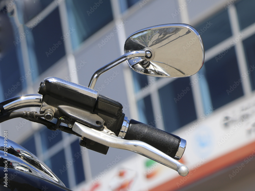 Motorcycle side mirror. handle and rear view mirror of motorcycle. Motorcycle side mirror. handle and rear view mirror of motorcycle.
