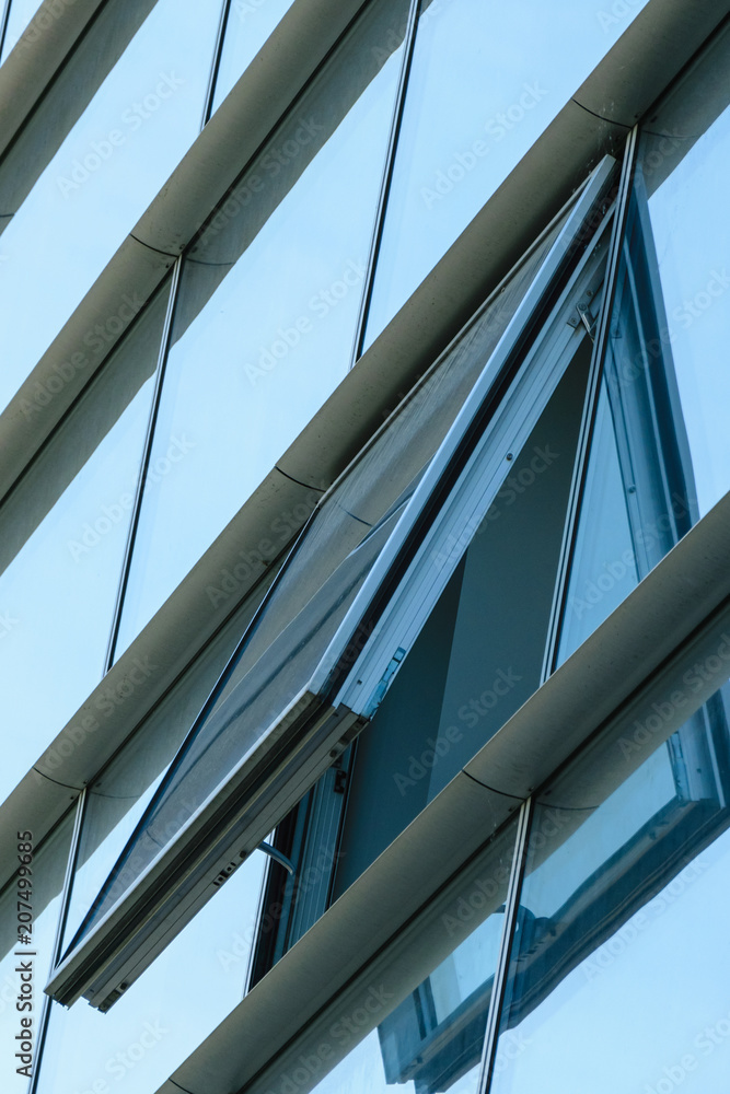 open window in a glass wall open window in a glass wall