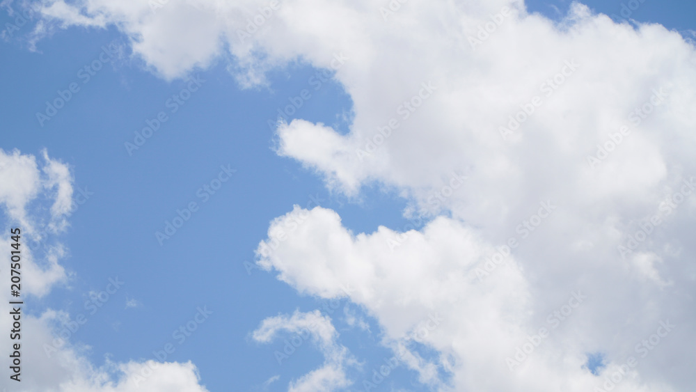Obraz premium Clouds and clear blue sky