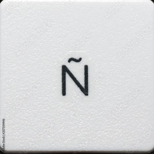 Spanish letter ñ on a laptop keyboard with white keys