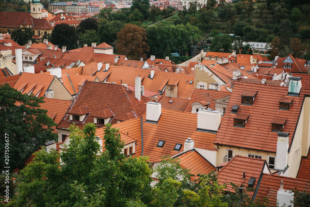 Beautiful traditional houses with orange tiled roofs in Prague in the Czech Republic