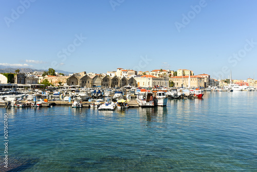 View of the Venetian port of Chania with the ancient venetian shipyards and center of mediterranean architecture