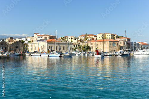 View of the Venetian port of Chania with the center of mediterranean architecture  ships and pleasure boats