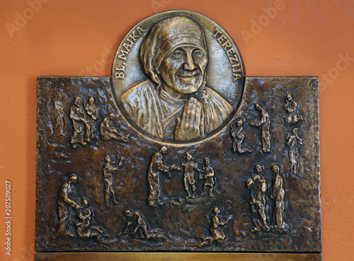 Relief with scenes from the life of Saint Mother Teresa of Calcutta, Chapel of Saint Dismas in Zagreb, Croatia  photo