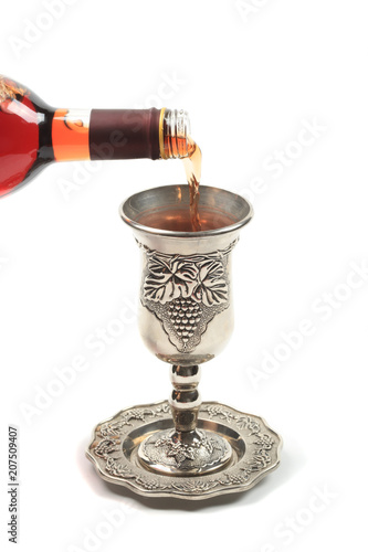 Wine poured into kiddush cup