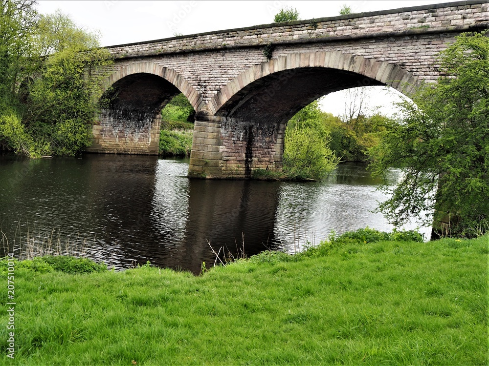 Arched viaduct over the River Wharf near Tadcaster, Yorkshire, England