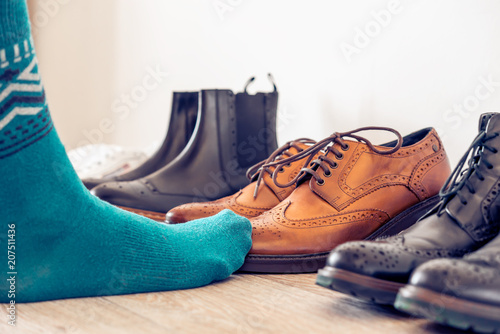 The concept of choosing men's shoes. Brown brogues, a classic Shoe.