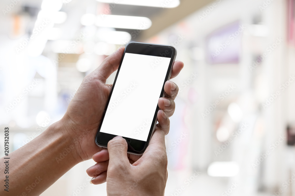Smart phone showing blank screen in man hand with blurred Background Smart phone showing blank screen in man hand with blurred Background