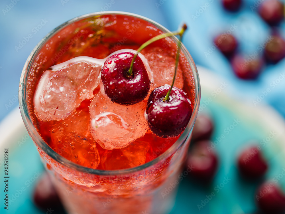 custom made wallpaper toronto digitalCLose-up of Iced organic cherry lemonade with fresh berries on the blue table, top view