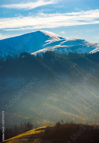 snowy top of Velykyi Verkh. beautiful morning scenery of late autumn in Carpathian mountains, Ukraine photo