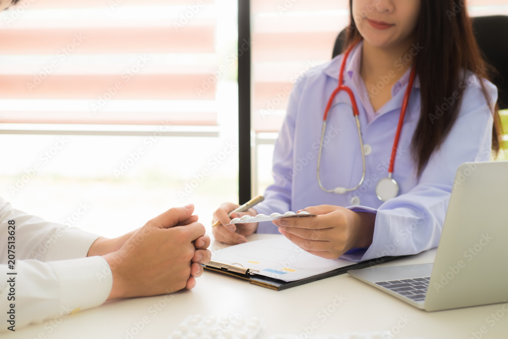 Doctor consulting patient and examining health in clinic or hospital mental health service center. Diagnostic, healthcare, medical service, consultation or education, healthy lifestyle concept Doctor consulting patient and examining health in clinic or hospital mental health service center. Diagnostic, healthcare, medical service, consultation or education, healthy lifestyle concept