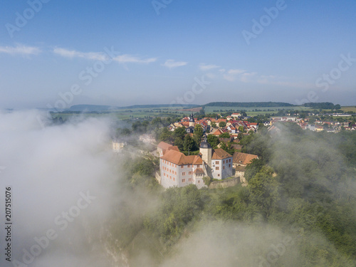 Three castles seen over cloud sea in Dornburg, Thuringia photo