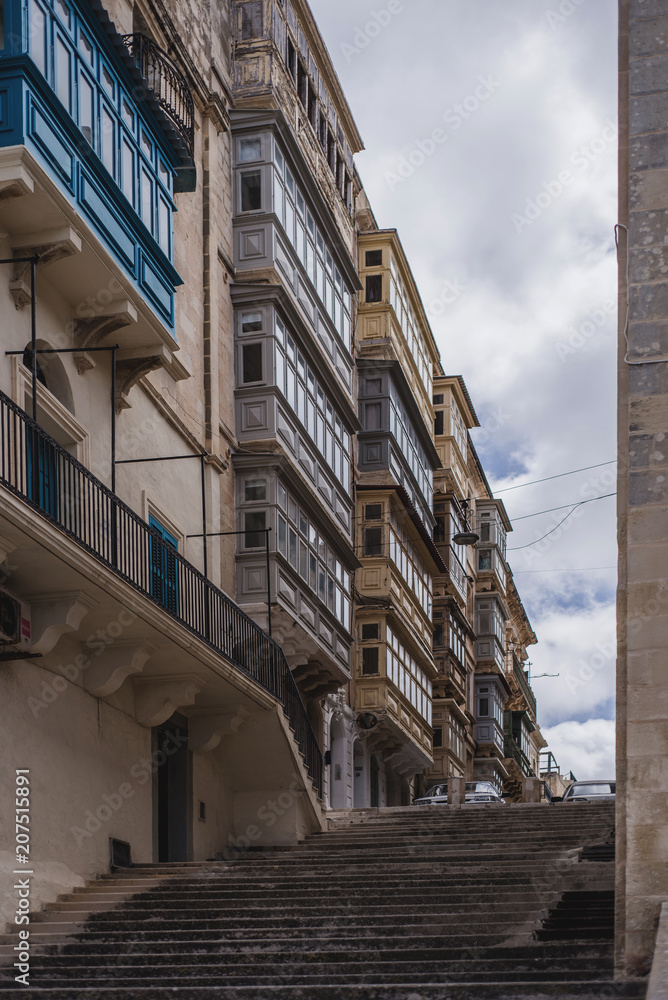 Photo of Typical street of Malta, ancient buildings and architecture