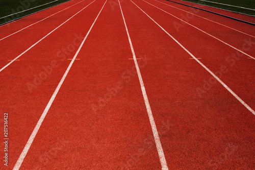 track running, Red treadmill in sport field with sgreen background.