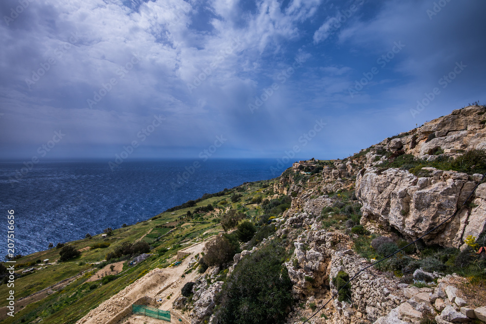 Photo of Dingli Cliffs and Mediterranean Sea, Malta Photo of Dingli Cliffs and Mediterranean Sea, Malta