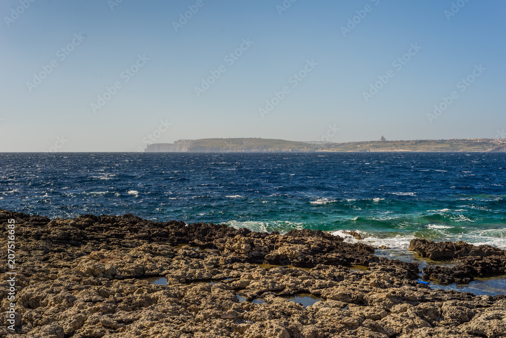 Photo of Sea water beating against rock, Cirkewwa, Malta Photo of Sea water beating against rock, Cirkewwa, Malta