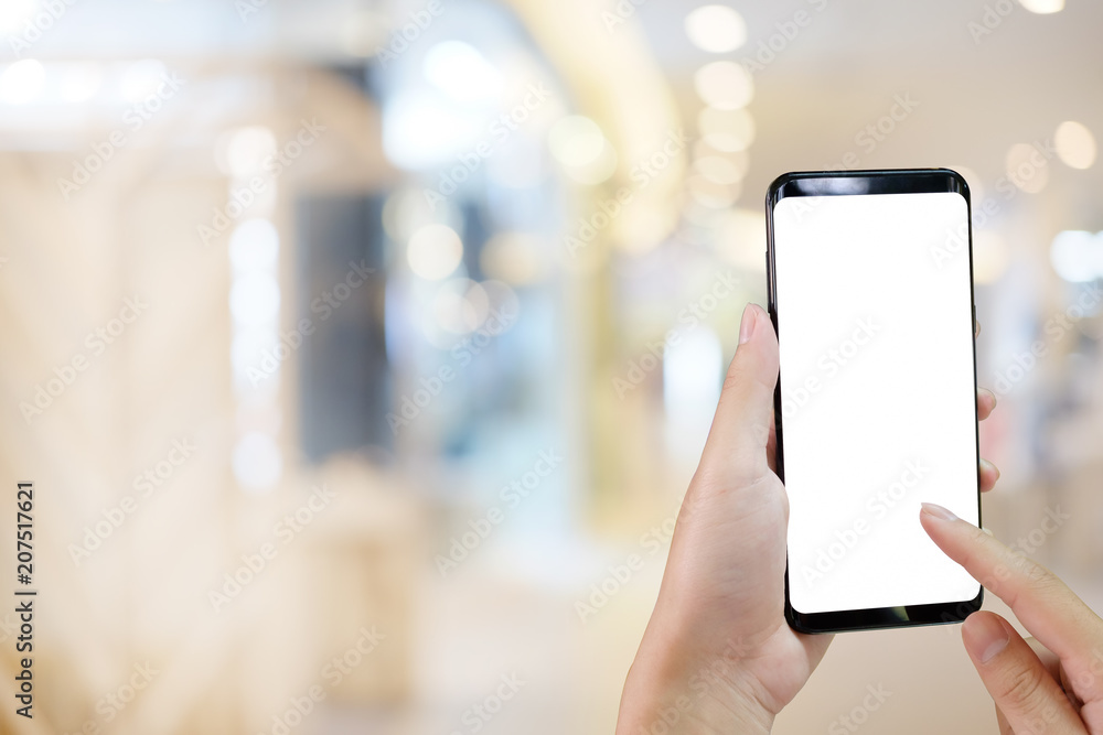 Hands touch on display smartphone screen empty for present on blur background. Hands touch on display smartphone screen empty for present on blur background.