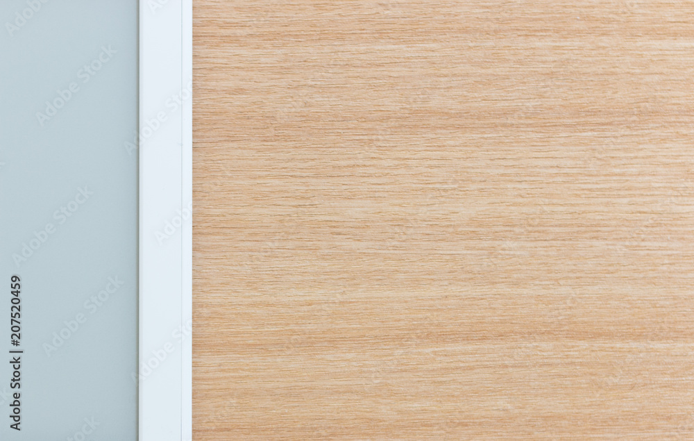 Naklejka premium Lay Flat ebook reader on wooden surface