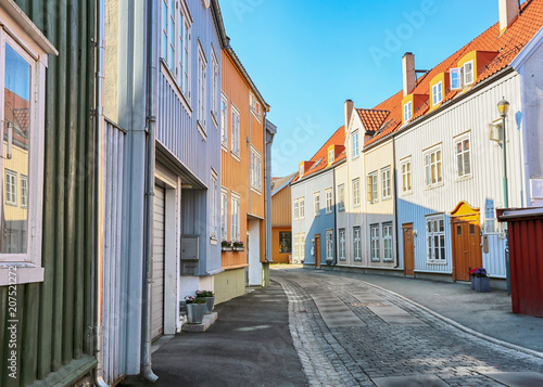 Bakklandet , old neighbourhood in Trondheim, with small wooden houses and narrow streets. it is among the major tourist attractions in the city. © liramaigums