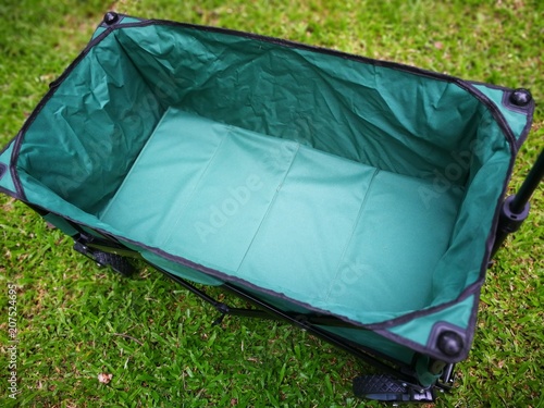 a green Cart for using in camping ltravel photo