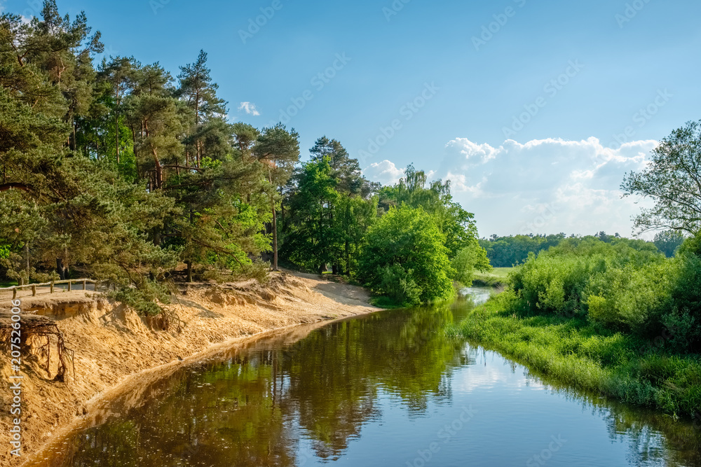 Typical Dutch landscape of 't Lutterzand, a forest area near the German border and a geological monument. It is characterised by the river The Dinkel that passes through and visited by many tourists. Typical Dutch landscape of 't Lutterzand, a forest area near the German border and a geological monument. It is characterised by the river The Dinkel that passes through and visited by many tourists.
