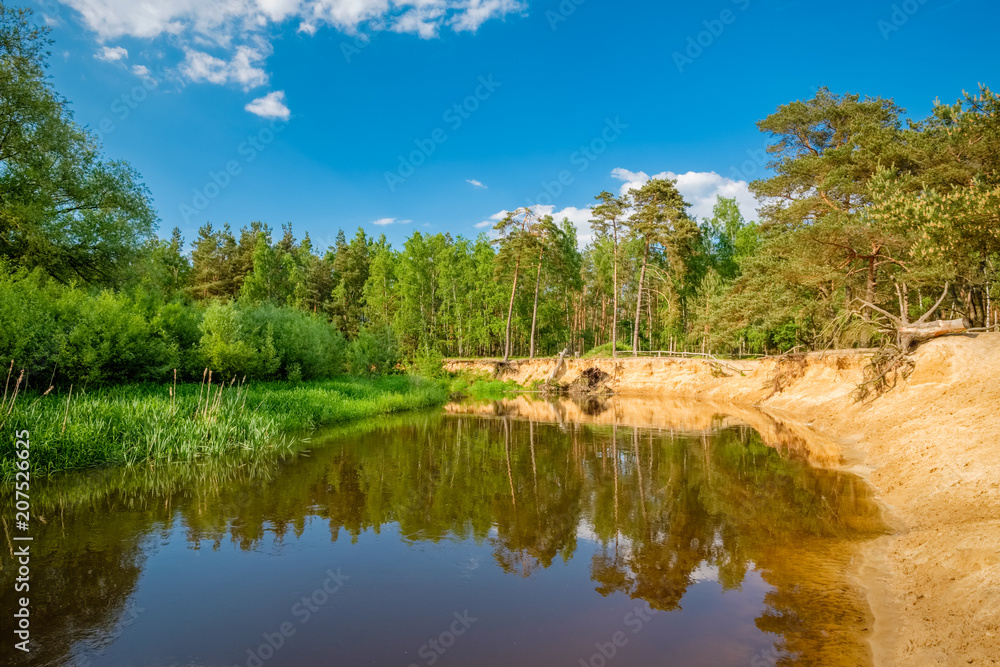 Typical Dutch landscape of 't Lutterzand, a forest area near the German border and a geological monument. It is characterised by the river The Dinkel that passes through and visited by many tourists. Typical Dutch landscape of 't Lutterzand, a forest area near the German border and a geological monument. It is characterised by the river The Dinkel that passes through and visited by many tourists.