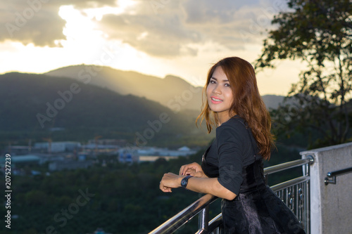 Bell portrait shooting in Rang Hill, Phuket, Thailand. She was capture with sunset background. This is a famous place sunset view point in Phuket city. © eltonmaxim