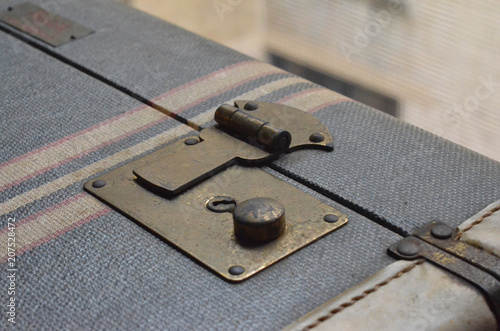 Vászonkép Vintage Striped Suitcase Lock Closeup 1