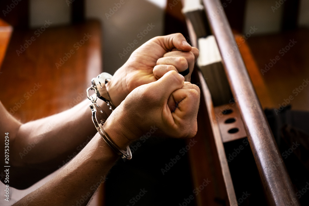 Φωτογραφία Male with a Handcuffed in the Church, Concept Piicture of the Sinner Who Need Jesus