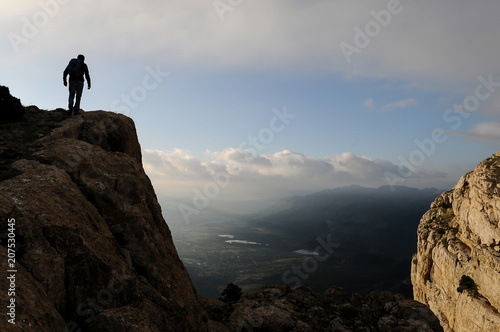 dangerous and cliff high mountain climber © emerald_media