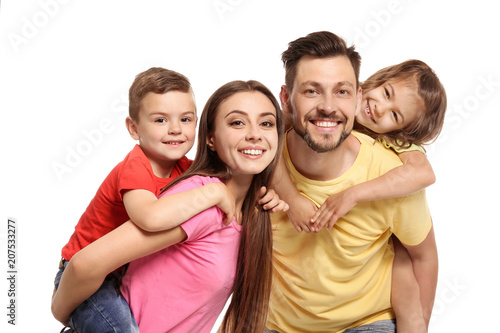 Portrait of happy family with children on white background photo