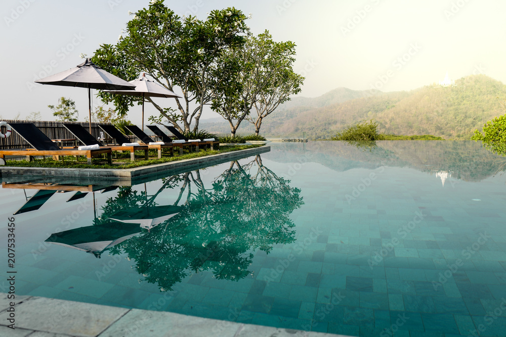 Fototapeta premium Swimming pool terrace with mountain view