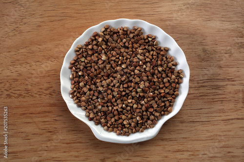 Buckwheat grains on ceramic plate