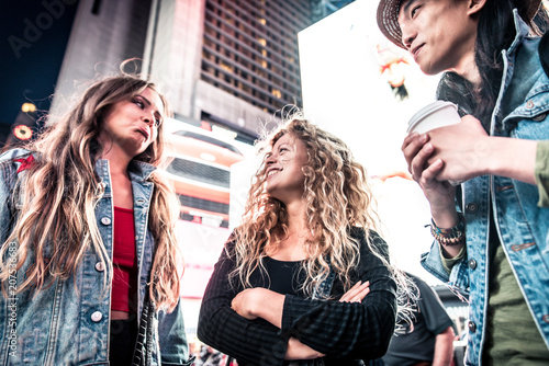 Friends meeting outdoors