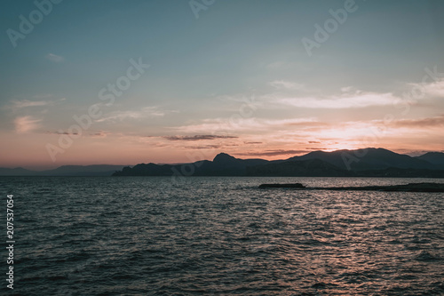 Beautiful panoramic view of the sea coast during sunset. Crimea  Sudak  Koktebel