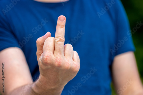 Canvastavla Young male person showing his middle finger