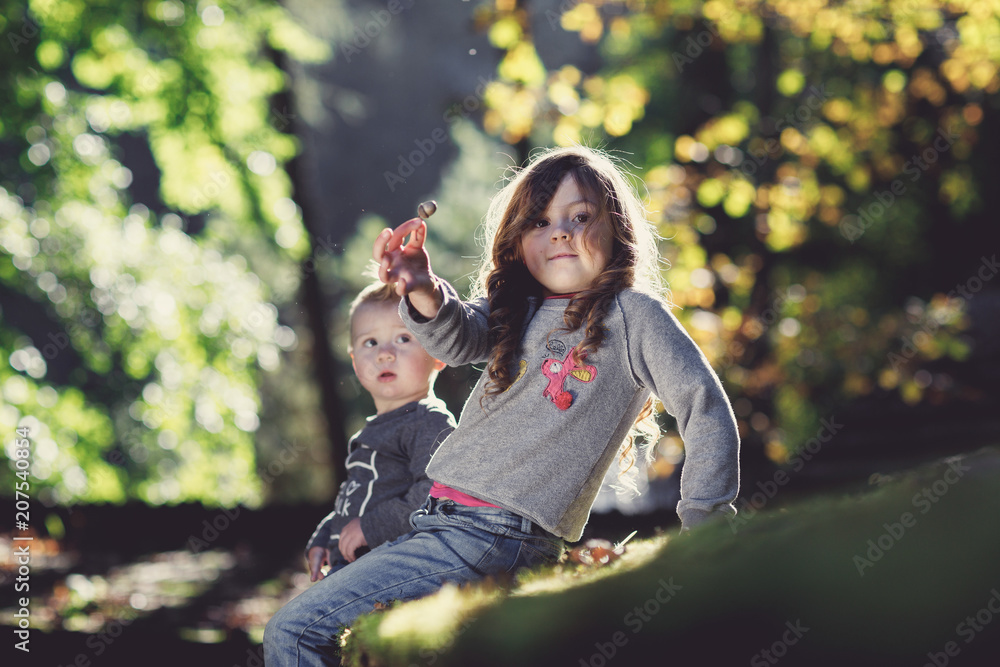 Happiness boy and girl fun outdoor under sunlight Happiness boy and girl fun outdoor under sunlight
