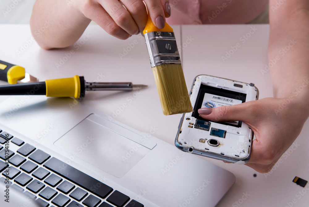 Mobile phone repair in workshop