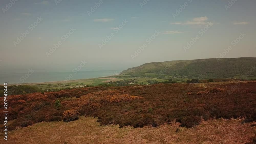 Aerial of Somerset countryside and coast Porlock and Minehead England with sea in the background Aerial of Somerset countryside and coast Porlock and Minehead England with sea in the background
