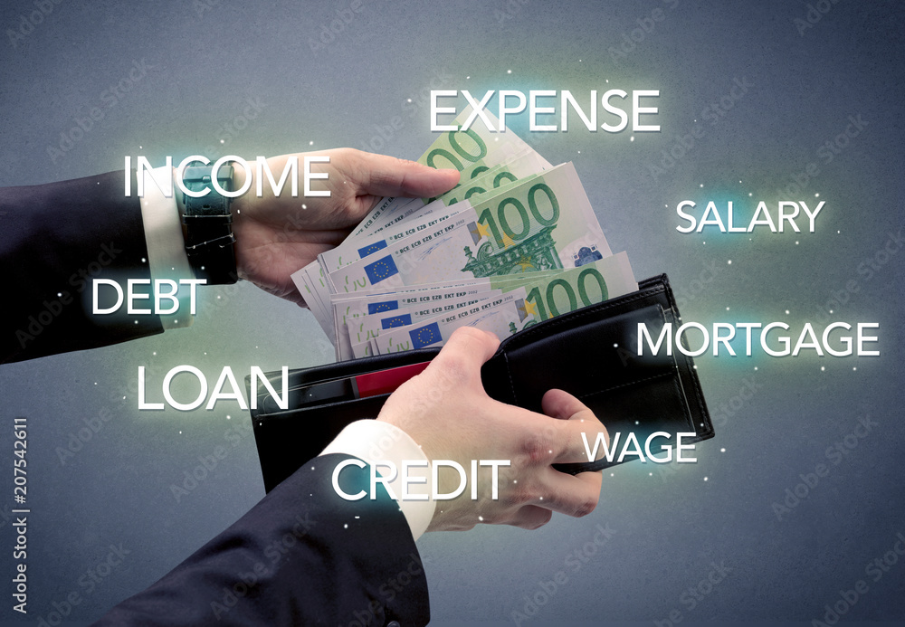 Businessman's hand takes out euro from wallet with bank keywords Businessman's hand takes out euro from wallet with bank keywords