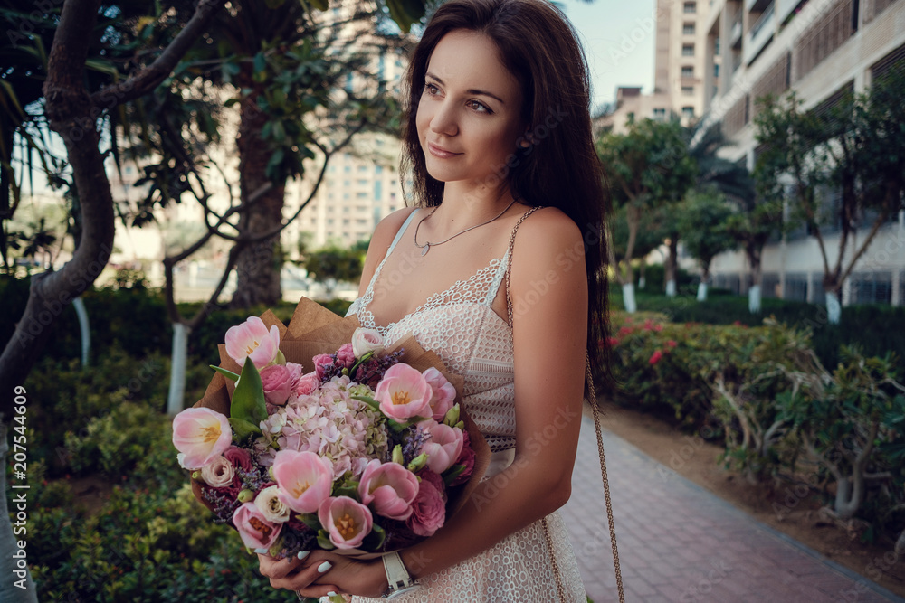 beautiful woman on a street of Dubai city beautiful woman on a street of Dubai city