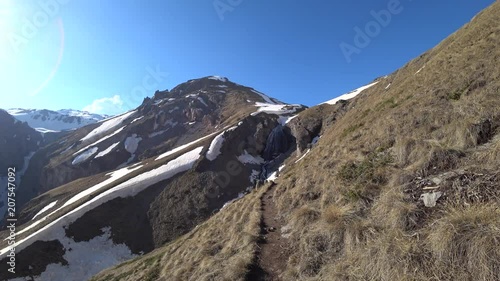 Hiking pathway view on a sunny spring day among the mountains