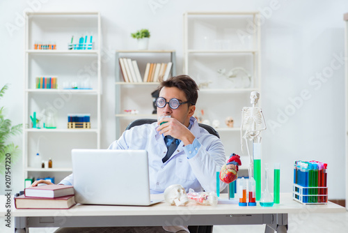 Wallpaper Mural Funny doctor having fun in hospital lab Torontodigital.ca