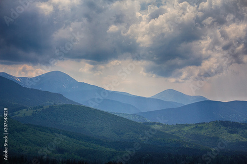 Dramatic sky above the Montenegrin ridge, the mountains of Goverla and Petros. Carpathians