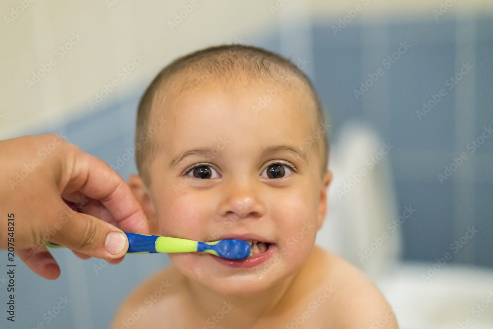 Mom brush cleans teeth funny kid 2 years Mom brush cleans teeth funny kid 2 years