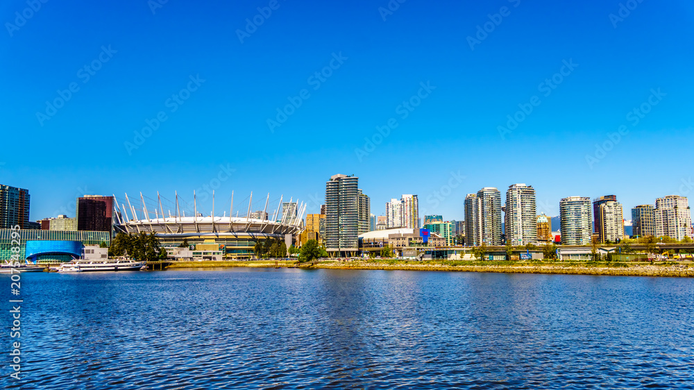 Skyline of the City of Vancouver, British Columbia, Canada as seen from the False Creek Inlet on a clear summer day