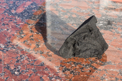 coal on a granite stone, the concept of heat and energy
