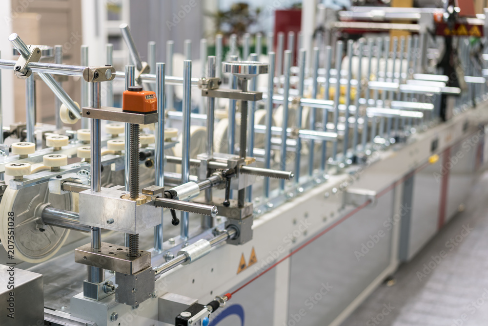 Textile processing machine. Machinery and equipment in a spinning production company Textile processing machine. Machinery and equipment in a spinning production company