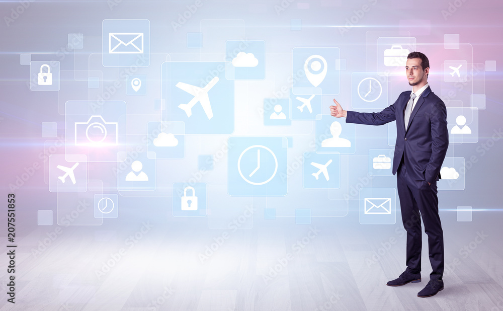 Businessman departs to a business trip with social media and travel symbol concept
Businessman departs to a business trip with social media and travel symbol concept
